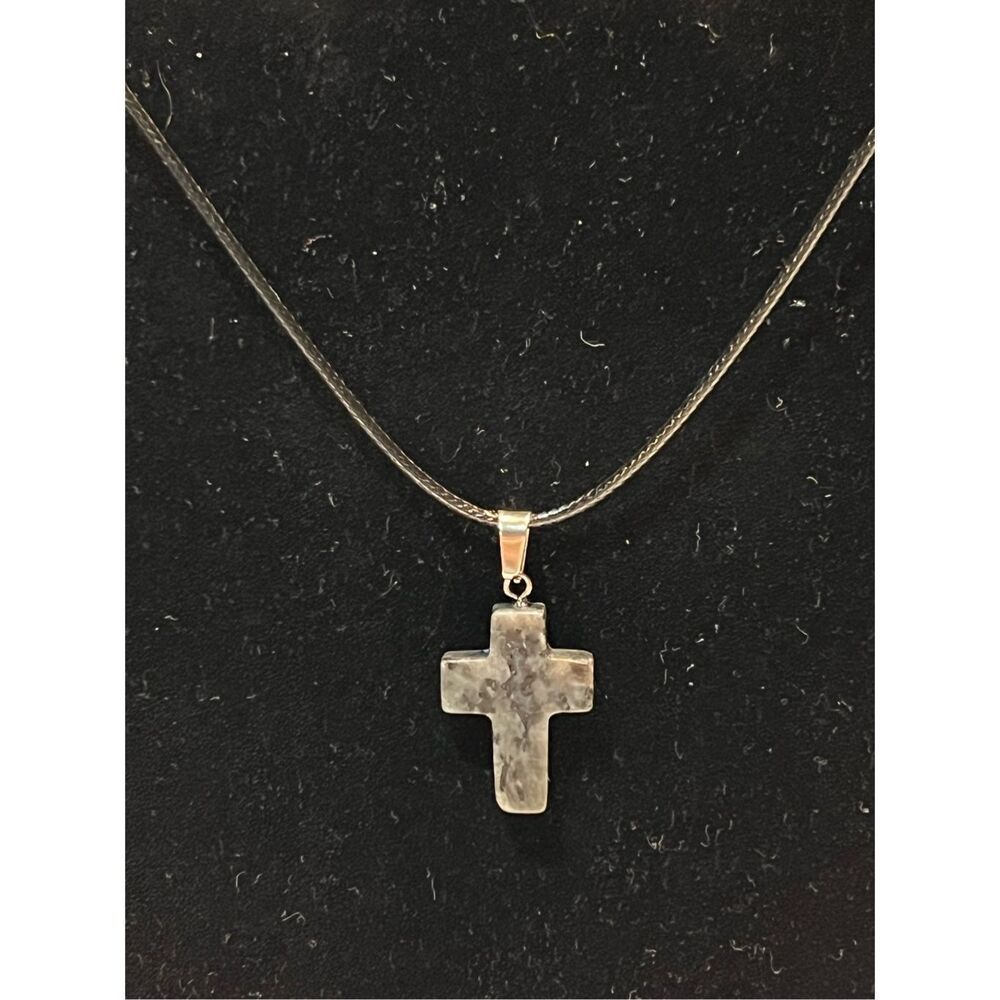 Gray Stone Cross on a Black Necklace Cord